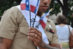 MA at Alamo with Texas flags-min